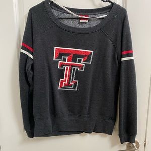Texas tech sweater with gems. New condition. Size large.